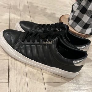 Women’s black leather quilted Calvin Klein sneakers - womens size 11